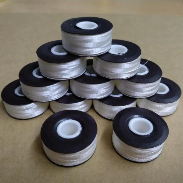 Magnetic-sided Prewound bobbin thread